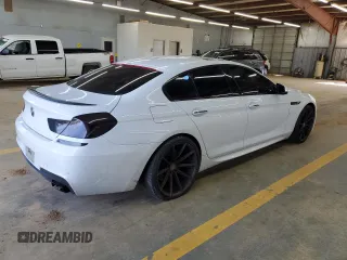 2015 BMW 6 Series 650i with VIN WBA6B2C5XFD799226, listed as a Copart auction lot 51317235 with 128,464 mi miles and Clean Title. Bid and sale history available at carsss.com. Image 3.