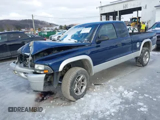 2004 Dodge Dakota SLT with VIN 1D7HG42N74S665198, listed as a IAAI auction lot 41477799 with 213,175 mi miles. Bid and sale history available at carsss.com. Image 2.