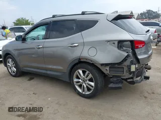 2015 Hyundai Santa Fe z VIN 5XYZW4LA9FG283826, wystawiony jako IAAI lot #42289253 z przebiegiem 120 369 mil mil oraz . Historia ofert i sprzedaży dostępna na DreamBid. Obrazek 3.