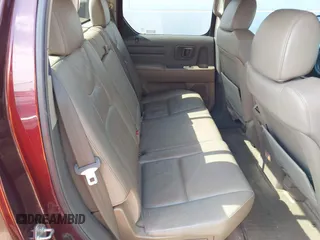 2007 Honda Ridgeline RTL with VIN 2HJYK16587H518901, listed as a IAAI auction lot 42762425 with 206,243 mi miles and . Bid and sale history available at DreamBid. Image 8.