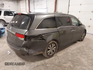2014 Honda Odyssey EX-L with VIN 5FNRL5H67EB056983, listed as a IAAI auction lot 42318699 with 256,267 mi miles and . Bid and sale history available at DreamBid. Image 4.