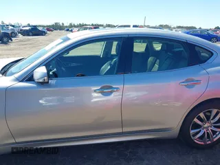 2017 Infiniti Q70 3.7 with VIN JN1BY1AP3HM740250, listed as a IAAI auction lot 41858552 with 173,907 mi miles and . Bid and sale history available at DreamBid. Image 14.