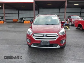 2019 Ford Escape Titanium z VIN 1FMCU9J99KUA18880, wystawiony jako IAAI lot #40830436 z przebiegiem 117 499 mil mil oraz . Historia ofert i sprzedaży dostępna na DreamBid. Obrazek 12.