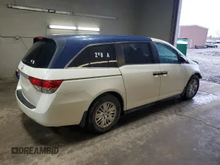 2016 Honda Odyssey LX with VIN 5FNRL5H21GB043033, listed as a Copart auction lot 50704365 with 197,484 mi miles and Salvage Title. Bid and sale history available at DreamBid. Image 3.