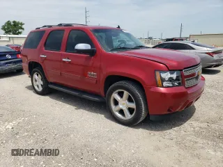 2012 Chevrolet Tahoe LS with VIN 1GNSCAE01CR227459, listed as a Copart auction lot 56353955 with 201,836 mi miles and Salvage title. Bid and sale history available at DreamBid. Image 4.