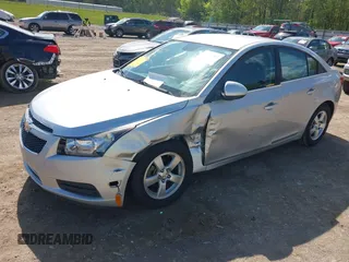 2014 Chevrolet Cruze 1LT with VIN 1G1PC5SBXE7320337, listed as a IAAI auction lot 42010404 with 69,270 mi miles and . Bid and sale history available at DreamBid. Image 6.