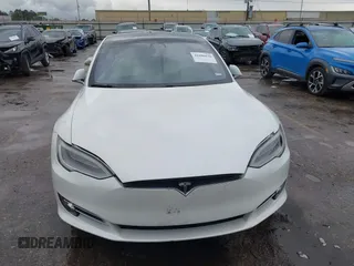 2021 Tesla Model S Long Range Plus with VIN 5YJSA1E21MF425482, listed as a IAAI auction lot 41886030 with Not provided miles and . Bid and sale history available at DreamBid. Image 17.