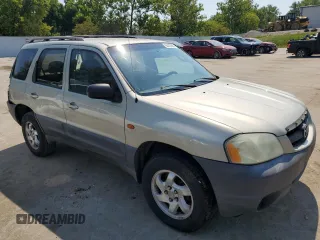 2004 Mazda Tribute DX with VIN 4F2YZ02B74KM13874, listed as a Copart auction lot 65422864 with 288,215 mi miles and Salvage Title. Bid and sale history available at carsss.com. Image 4.