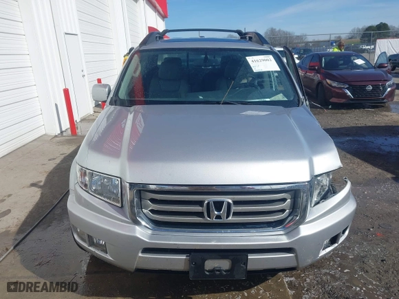 2014 Honda Ridgeline RTL with VIN 5FPYK1F51EB012843, listed as a IAAI auction lot 41629002 with 114,761 mi miles. Bid and sale history available at carsss.com. Image 12.
