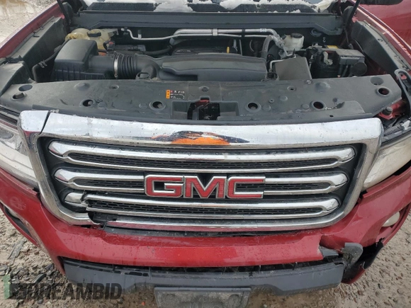 2018 GMC Canyon z VIN 1GTH6CEA3J1220524, wystawiony jako Copart lot #83235194 z przebiegiem 61 366 mil mil oraz Szkoda całkowita • Salvage title. Historia ofert i sprzedaży dostępna na DreamBid. Obrazek 11.