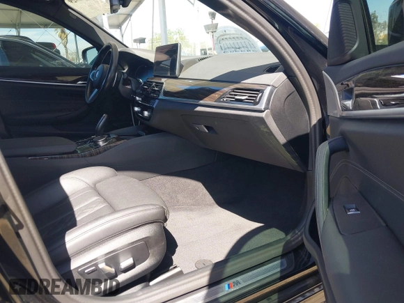 2023 BMW 5 Series 530e with VIN WBA13AG07PCL98367, listed as a IAAI auction lot 42020929 with 69,913 mi miles and . Bid and sale history available at DreamBid. Image 5.