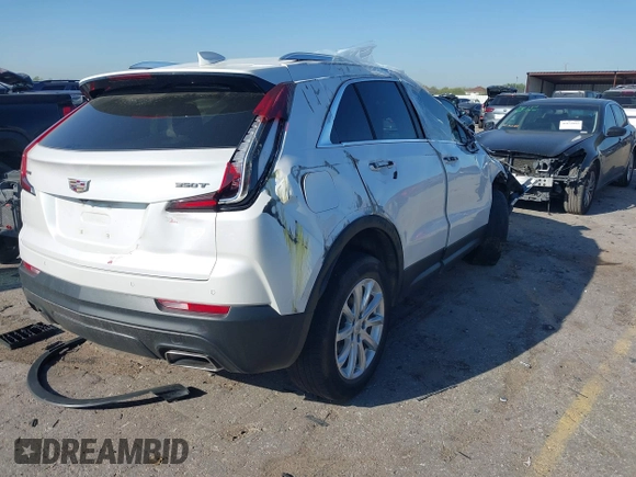 2022 Cadillac XT4 FWD Luxury with VIN 1GYAZAR48NF170949, listed as a IAAI auction lot 41857671 with 25,881 mi miles and . Bid and sale history available at carsss.com. Image 4.