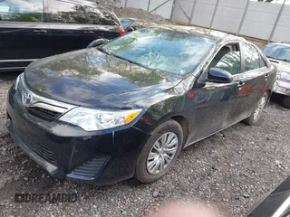 2014 Toyota Camry L with VIN 4T4BF1FK7ER395057, listed as a IAAI auction lot 42215441 with 166,247 mi miles and . Bid and sale history available at DreamBid. Image 23.