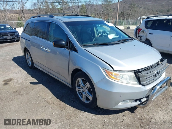 2012 Honda Odyssey Touring with VIN 5FNRL5H93CB042392, listed as a IAAI auction lot 41859533 with 169,141 mi miles. Bid and sale history available at carsss.com. Image 1.