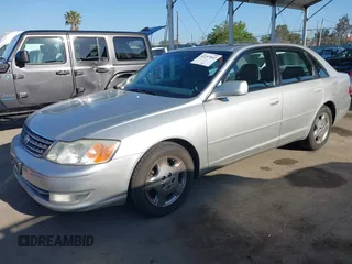 2003 Toyota Avalon XL z VIN 4T1BF28B03U321618, wystawiony jako IAAI lot #42297842 z przebiegiem 142 154 mil mil oraz . Historia ofert i sprzedaży dostępna na DreamBid. Obrazek 18.