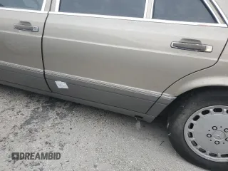 1989 Mercedes-Benz 560 with VIN WDBCA39E1KA479955, listed as a Copart auction lot 76202804 with 132,546 mi miles and Salvage Title. Bid and sale history available at DreamBid. Image 12.