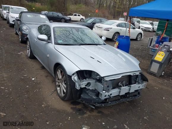 2008 Jaguar XK with VIN SAJWA43C889B21570, listed as a IAAI auction lot 42082547 with 99,783 mi miles. Bid and sale history available at carsss.com. Image 6.