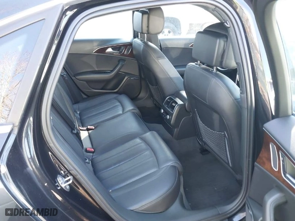 2014 Audi A6 3.0T Prestige with VIN WAUHGAFC8EN142187, listed as a IAAI auction lot 41833457 with 129,533 mi miles. Bid and sale history available at carsss.com. Image 8.