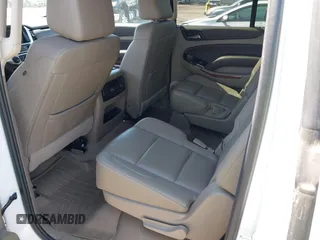 2020 Chevrolet Suburban Premier with VIN 1GNSCJKC9LR125292, listed as a IAAI auction lot 42073858 with 92,363 mi miles and . Bid and sale history available at DreamBid. Image 8.