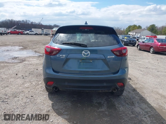 2016 Mazda CX-5 Grand Touring with VIN JM3KE4DY0G0629924, listed as a IAAI auction lot 41878154 with 78,196 mi miles. Bid and sale history available at carsss.com. Image 16.