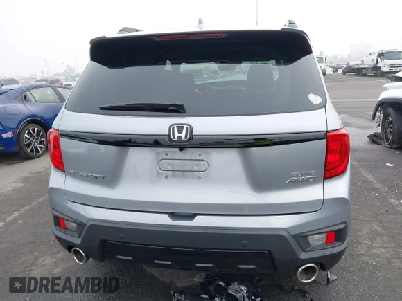 2023 Honda Passport Elite with VIN 5FNYF8H02PB029127, listed as a IAAI auction lot 41166484 with 16,200 mi miles and . Bid and sale history available at DreamBid. Image 16.