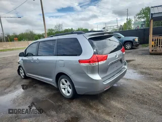 2012 Toyota Sienna LE AAS with VIN 5TDKK3DC4CS244048, listed as a Copart auction lot 55940585 with 163,222 mi miles and Clean Title. Bid and sale history available at DreamBid. Image 3.