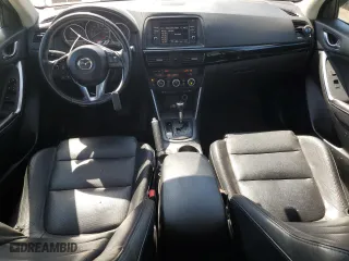 2014 Mazda CX-5 Grand Touring with VIN JM3KE4DY4E0305212, listed as a Copart auction lot 53145305 with 233,061 mi miles and Salvage Title. Bid and sale history available at carsss.com. Image 8.