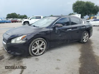2014 Nissan Maxima SV with VIN 1N4AA5AP4EC492490, listed as a Copart auction lot 63633875 with 119,493 mi miles and Salvage title. Bid and sale history available at DreamBid. Image 1.