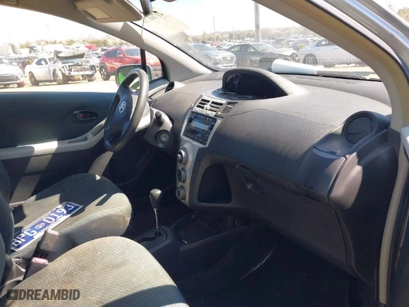2007 Toyota Yaris with VIN JTDJT923875124537, listed as a IAAI auction lot 41768716 with 281,065 mi miles. Bid and sale history available at carsss.com. Image 5.