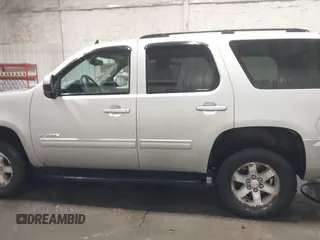 2011 GMC Yukon SLE with VIN 1GKS2AE01BR233860, listed as a IAAI auction lot 41838392 with 226,611 mi miles. Bid and sale history available at carsss.com. Image 14.