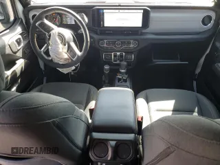 2024 Jeep Wrangler Sahara with VIN 1C4PJXEN7RW297948, listed as a Copart auction lot 54656795 with 12,292 mi miles and Salvage title. Bid and sale history available at DreamBid. Image 8.