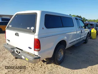 1999 Ford F-250 XL with VIN 1FTNX20L5XEC55084, listed as a IAAI auction lot 42050064 with 135,884 mi miles and . Bid and sale history available at DreamBid. Image 4.