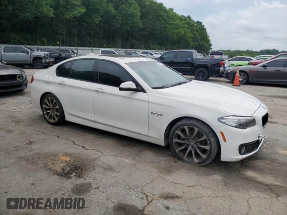 2016 BMW 5 Series 528i xDrive with VIN WBA5A7C5XGG148447, listed as a Copart auction lot 56825455 with 128,800 mi miles and Clean title. Bid and sale history available at DreamBid. Image 4.