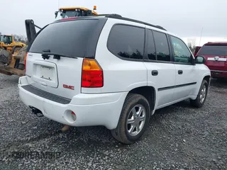 2009 GMC Envoy SLE with VIN 1GKDS33S892108589, listed as a IAAI auction lot 41883738 with 172,027 mi miles. Bid and sale history available at carsss.com. Image 4.