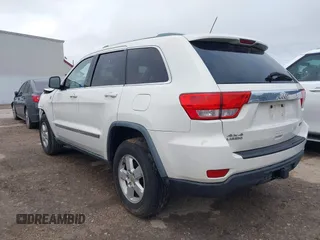 2012 Jeep Grand Cherokee Laredo with VIN 1C4RJFAG5CC224032, listed as a IAAI auction lot 42069334 with 106,614 mi miles. Bid and sale history available at carsss.com. Image 3.