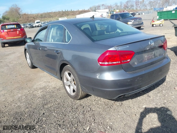2013 Volkswagen Passat SE with VIN 1VWBP7A36DC039148, listed as a IAAI auction lot 42075823 with 196,734 mi miles. Bid and sale history available at carsss.com. Image 3.