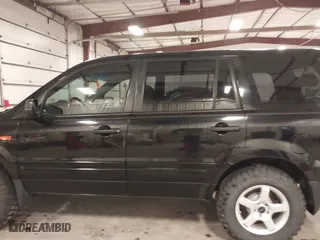 2007 Honda Pilot LX with VIN 5FNYF18117B009290, listed as a IAAI auction lot 41205310 with 150,081 mi miles. Bid and sale history available at carsss.com. Image 15.