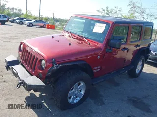 2011 Jeep Wrangler Unlimited Sport with VIN 1J4BA3H18BL598323, listed as a IAAI auction lot 41958043 with 154,354 mi miles. Bid and sale history available at carsss.com. Image 17.
