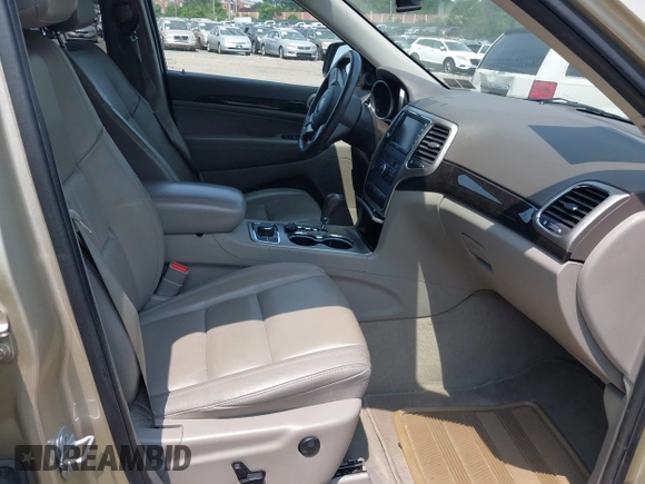 2011 Jeep Grand Cherokee Laredo with VIN 1J4RR4GG0BC713919, listed as a IAAI auction lot 42425229 with 139,379 mi miles and . Bid and sale history available at DreamBid. Image 5.