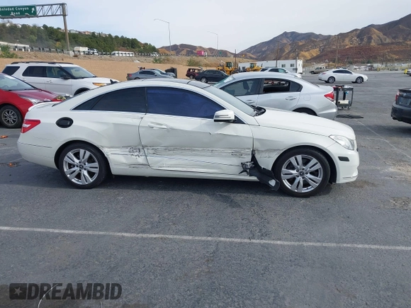 2012 Mercedes-Benz E 350 with VIN WDDKJ5KBXCF133020, listed as a IAAI auction lot 41023858 with 144,330 mi miles and . Bid and sale history available at DreamBid. Image 13.