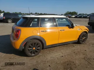 2016 MINI Hardtop 4 Door с VIN WMWXU1C51G2E16685, выставлен на аукционе Copart как лот 63425225 с пробегом 117 597 миль миль и Списание • Salvage title. История ставок и продаж доступна на DreamBid. Изображение 3.