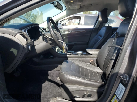 2013 Ford Fusion SE Hybrid z VIN 3FA6P0LU0DR274279, wystawiony jako Copart lot #57462315 z przebiegiem 272 825 mil mil oraz Szkoda całkowita • Salvage title. Historia ofert i sprzedaży dostępna na DreamBid. Obrazek 7.