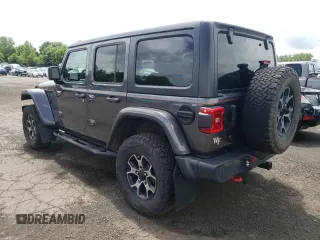 2018 Jeep Wrangler Unlimited Rubicon with VIN 1C4HJXFG1JW261472, listed as a Copart auction lot 63259345 with 60,457 mi miles and Salvage title. Bid and sale history available at DreamBid. Image 2.