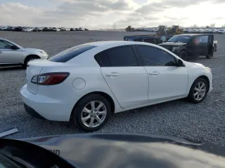 2011 Mazda 3 i Touring with VIN JM1BL1VF1B1389103, listed as a Copart auction lot 52934885 with 123,101 mi miles and Salvage Title. Bid and sale history available at DreamBid. Image 3.