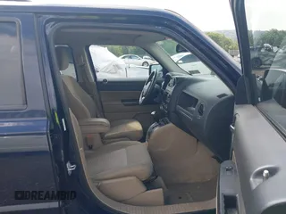 2014 Jeep Patriot Latitude with VIN 1C4NJRFB9ED687821, listed as a IAAI auction lot 42640433 with 161,502 mi miles and . Bid and sale history available at DreamBid. Image 5.