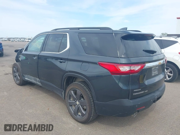 2020 Chevrolet Traverse LT with VIN 1GNEVHKW1LJ215299, listed as a IAAI auction lot 42160462 with 123,297 mi miles and . Bid and sale history available at DreamBid. Image 3.