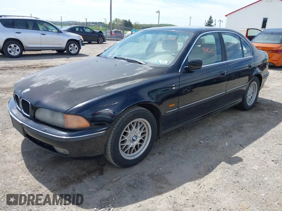1999 BMW 5 Series 528iA with VIN WBADM6331XBY29010, listed as a IAAI auction lot 42103420 with 196,575 mi miles. Bid and sale history available at carsss.com. Image 2.