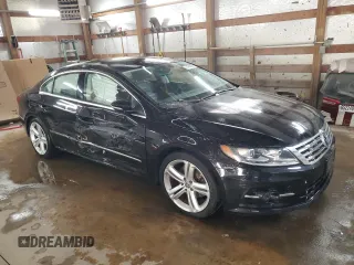 2014 Volkswagen CC R-Line with VIN WVWBN7AN3EE503237, listed as a Copart auction lot 77128394 with 84,995 mi miles and Salvage Title. Bid and sale history available at carsss.com. Image 4.