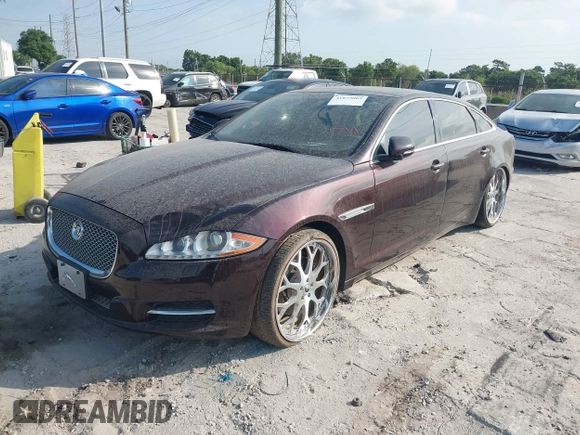 2013 Jaguar XJ Portfolio with VIN SAJWJ2GD2D8V44780, listed as a IAAI auction lot 41875069 with 87,806 mi miles and . Bid and sale history available at DreamBid. Image 2.