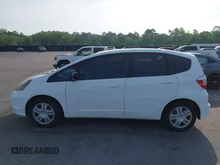 2010 Honda Fit with VIN JHMGE8H22AS022221, listed as a IAAI auction lot 42009796 with 101,904 mi miles. Bid and sale history available at carsss.com. Image 15.